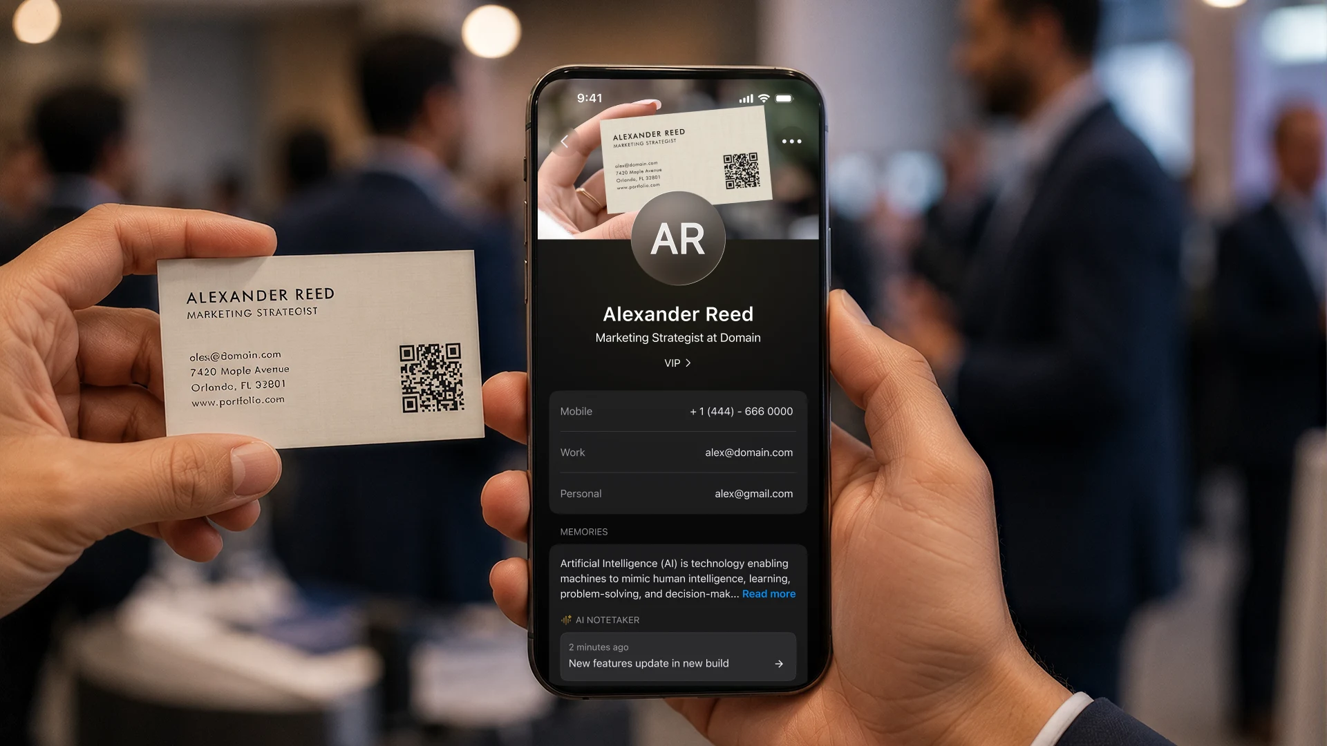 Paper business card being scanned into a structured digital contact on a phone